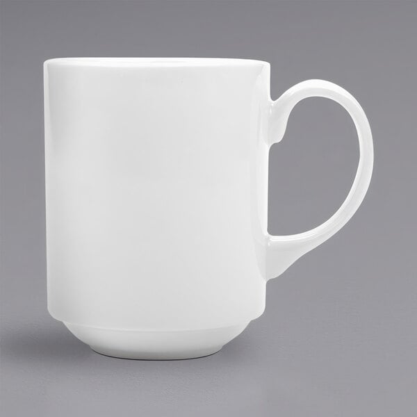 A white Corona by GET Enterprises Actualite mug with a handle.