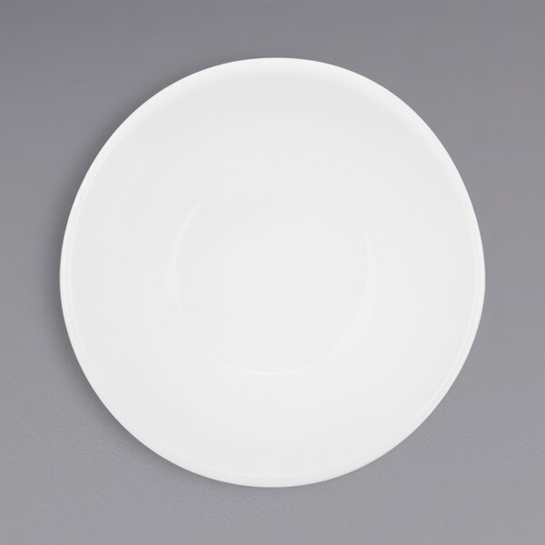 A white porcelain bowl with a round rim.