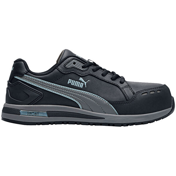 A black Puma women's athletic shoe with grey trim.