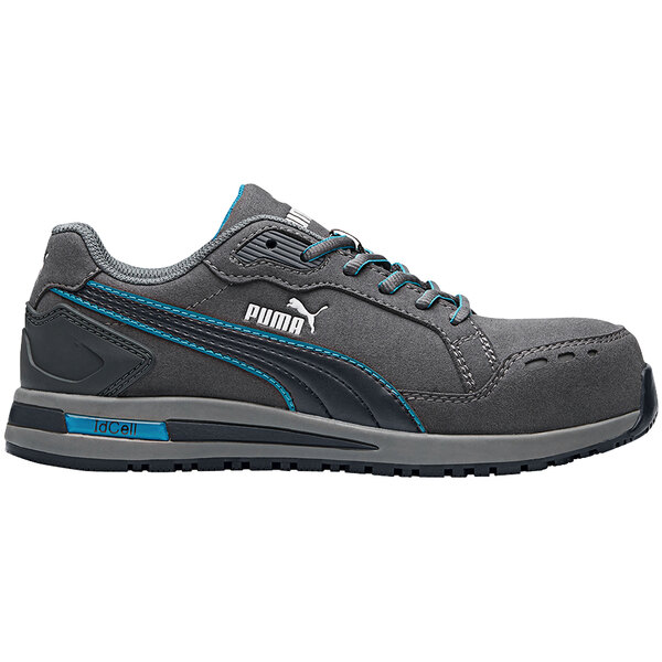 A grey and blue Puma women's athletic shoe with composite toe.