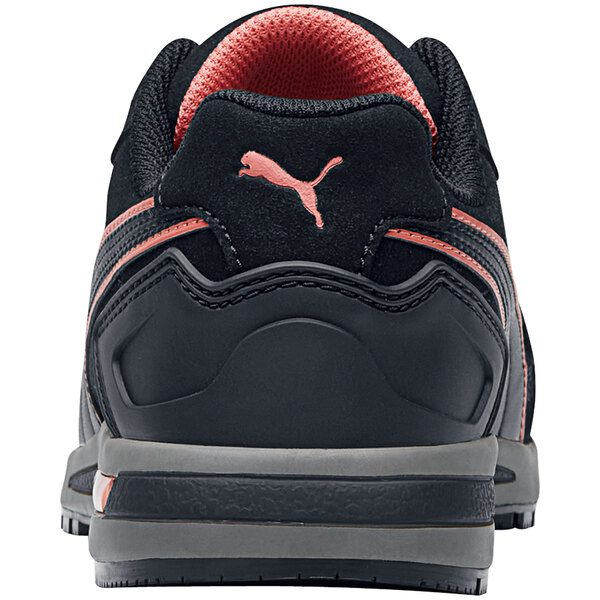 The back of a black Puma women's shoe with pink accents.