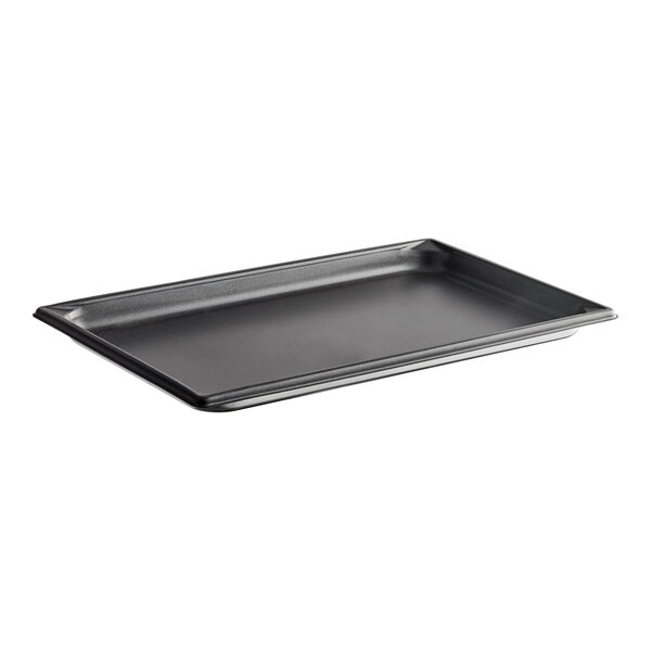 A Vollrath stainless steel rectangular steam table pan with a black SteelCoat x3 non-stick finish and a handle.