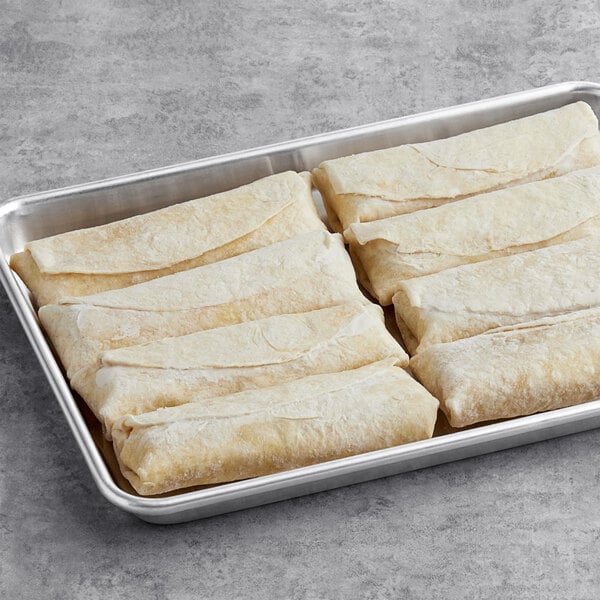 A tray of Sweet Street Desserts Banana Caramel Cheesecake Xangos on a table.