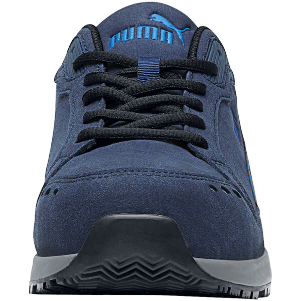 A navy Puma men's Airtwist low athletic shoe on a table.