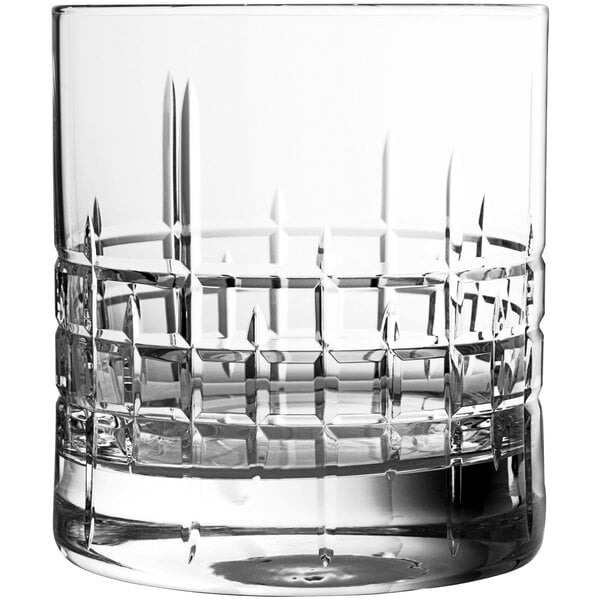 A close up of a Schott Zwiesel clear rocks glass with a diamond pattern.