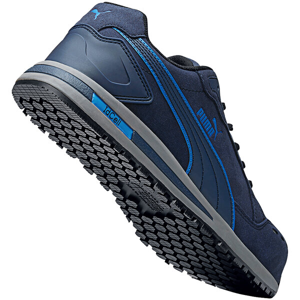 A close up of a navy Puma Airtwist low athletic shoe with composite toe.