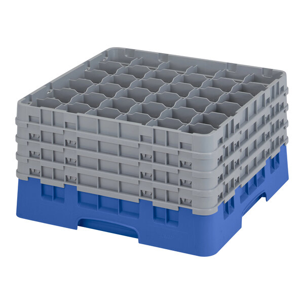 A stack of blue plastic Cambro glass racks with grey extenders.