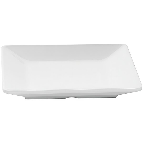 A white rectangular plate with a small square.