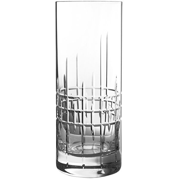 A close-up of a clear Schott Zwiesel Collins glass with a checkered design.