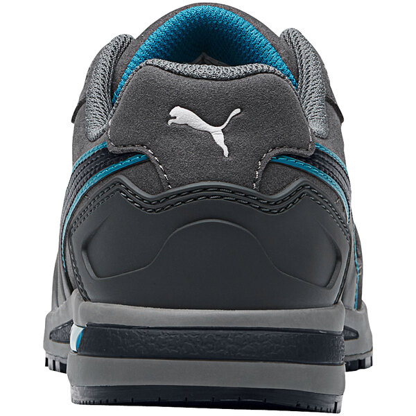 The back of a gray and blue Puma athletic shoe with a white Puma logo.