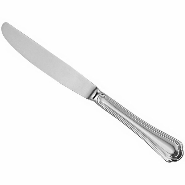 A Sant'Andrea Rossini stainless steel table knife with a white handle on a white background.