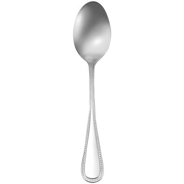 An Oneida Pearl stainless steel serving spoon with a white background.