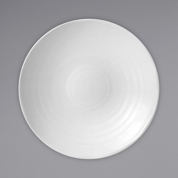 A white Dudson Organic coupe china bowl with a white rim.
