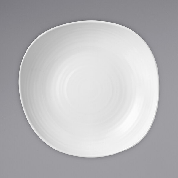 A Dudson Organic white china bowl with a wobbly rim.