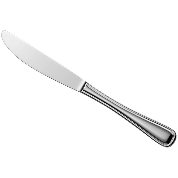 A silver Oneida New Rim II table knife with a white handle.