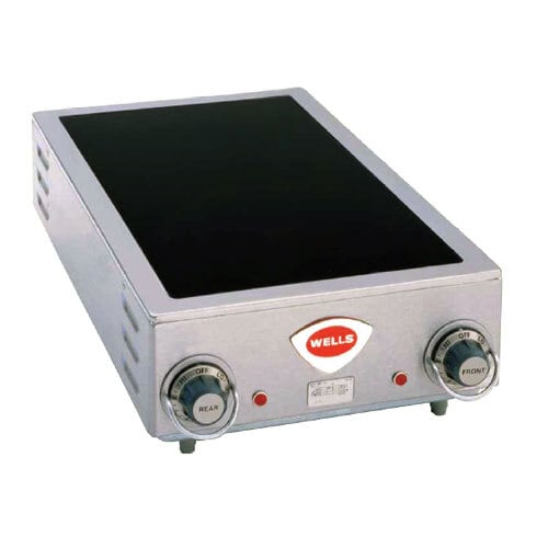 A Wells countertop electric hot plate with a black ceramic top.