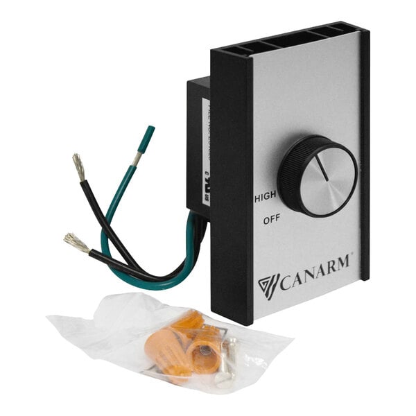 A wall-mounted fan control unit with a rotary knob, labeled "HIGH" and "OFF," attached wires, and a small bag containing orange wire connectors and screws.