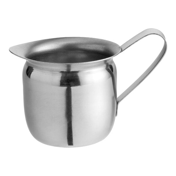 A 3 oz. stainless steel bell creamer with a handle and spout.