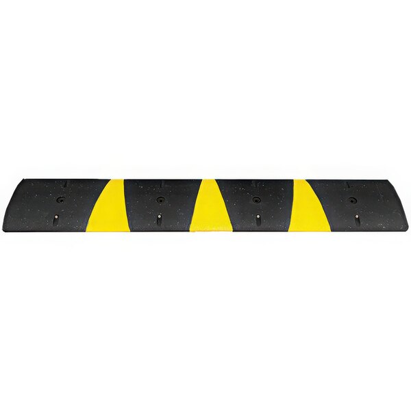 A black plastic speed bump with yellow reflective stripes and cat eye reflectors.