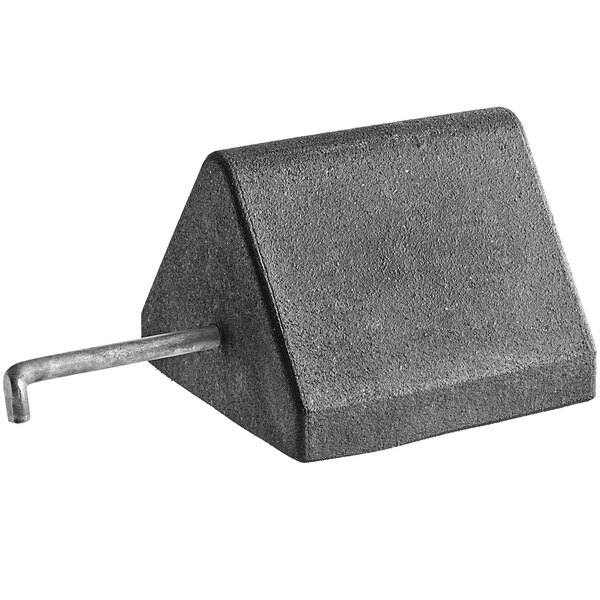 A black Plasticade rubber wheel chock with a galvanized steel pole handle.