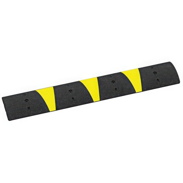 A black rubber speed bump with three yellow stripes.