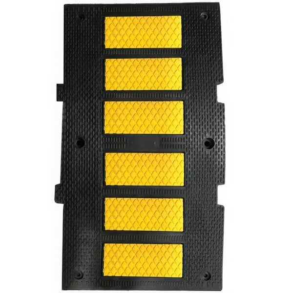 A black and yellow rectangular Plasticade speed hump with yellow reflective stripes.