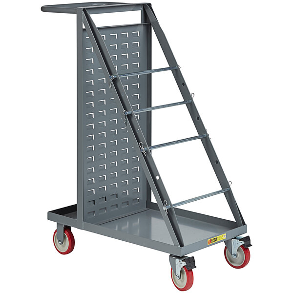 A gray metal Little Giant wire reel cart with red wheels.