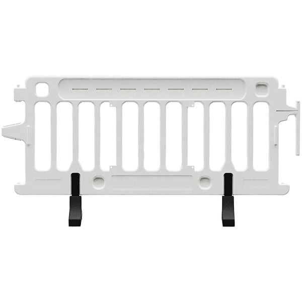 A white Plasticade barricade with black legs.