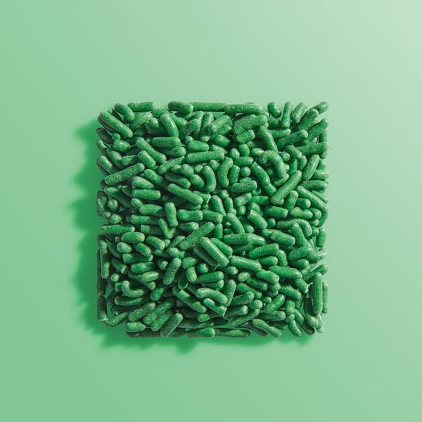 A square pile of green sprinkles.