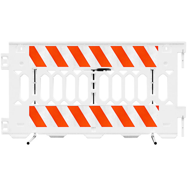 A white Plasticade barricade with white diamond grade striped sheeting on both sides.