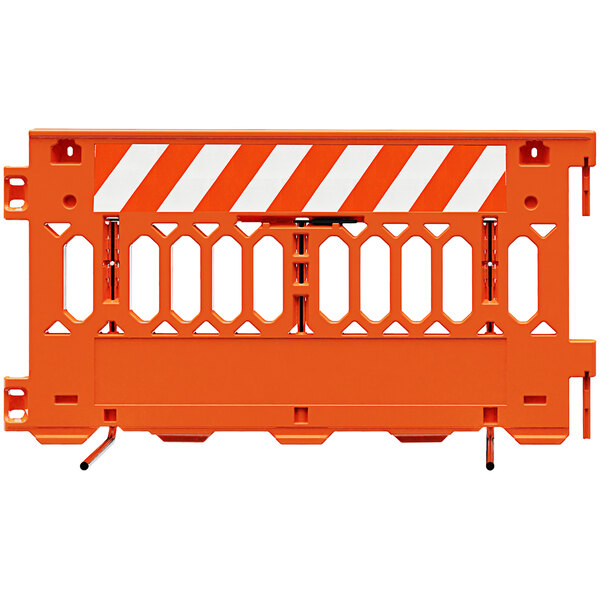 An orange Plasticade Pathcade parade barricade with white stripes on one side.