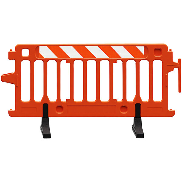 An orange Plasticade Crowdcade barricade with white and orange striped sheeting on one side.