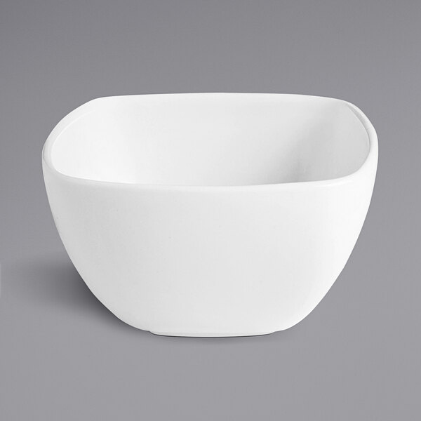 A white square bowl on a gray background.