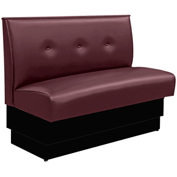 A red upholstered American Tables & Seating booth seat with a 3-button tufted back.