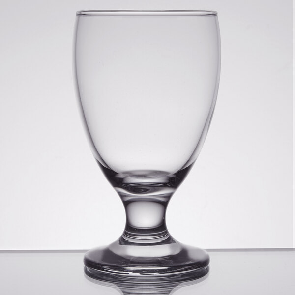 An Anchor Hocking Excellency wine goblet with a clear glass and a base.