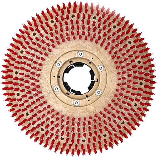 A close-up of a white circular tufted pad driver with red tufts.