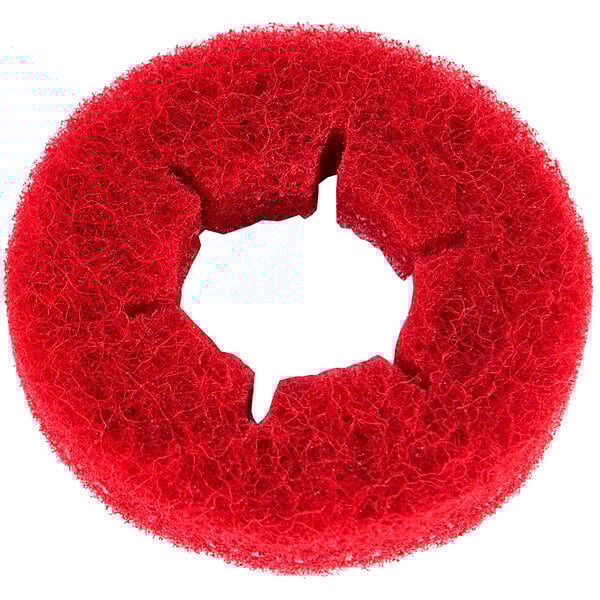A red Tornado scrub polishing pad with a hole in the middle.
