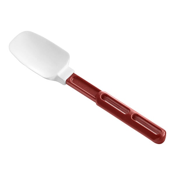 A white Vollrath SoftSpoon Silicone Spoonula with a red handle.