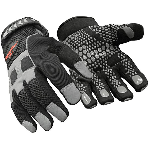 A pair of black RefrigiWear insulated gloves with white dots on the palm.