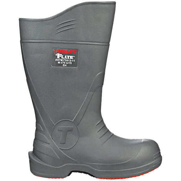 A grey Tingley safety boot with red soles.
