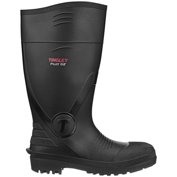 A black Tingley knee boot with red "Pilot" text on the toe.