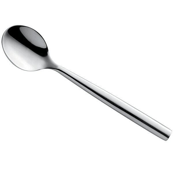 An Amefa Carlton stainless steel teaspoon with a silver handle.