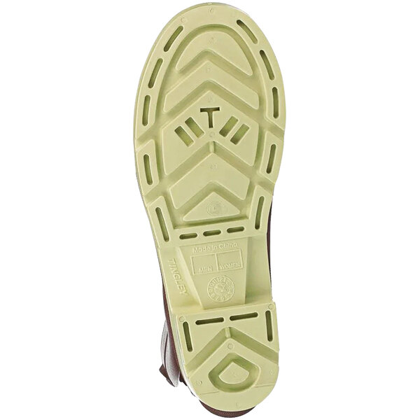 The green sole of a Tingley knee boot.