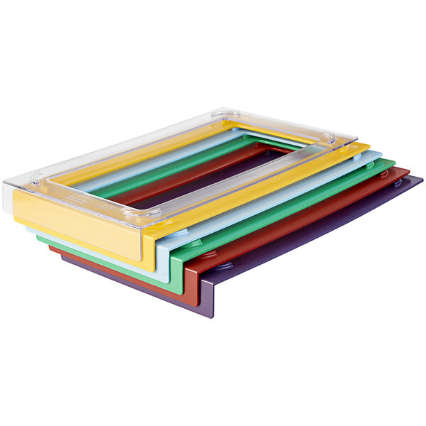 Red plastic pan stackers for 1/2 size stainless steel hotel pans.