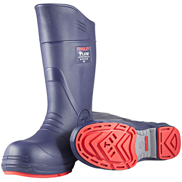 A pair of blue Tingley Flite safety boots with red Chevron-Plus outsoles.