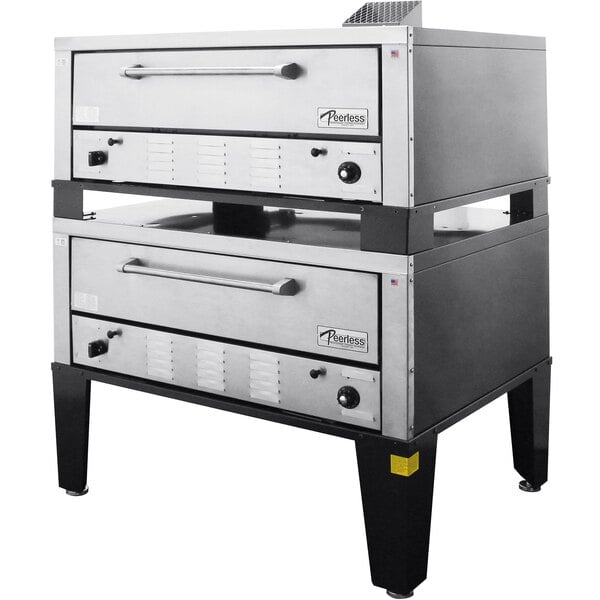 A Peerless natural gas double deck pizza oven with stainless steel exteriors.