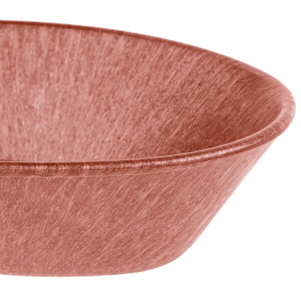 A white polyethylene oval basket with a paprika rim.