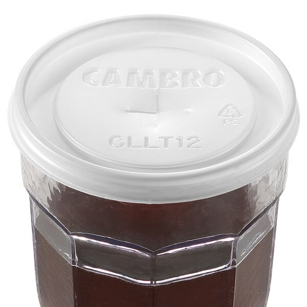 A translucent plastic Cambro lid with a straw slot.