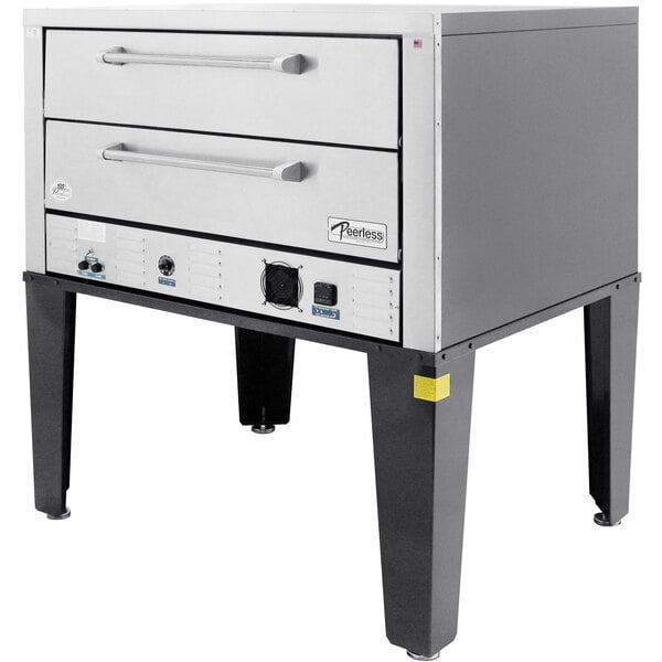 A large rectangular metal Peerless electric double deck pizza oven with two drawers.