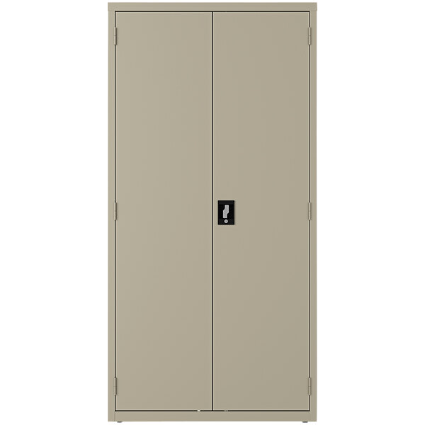 A grey steel Hirsh Industries wardrobe cabinet with black handles and two doors.